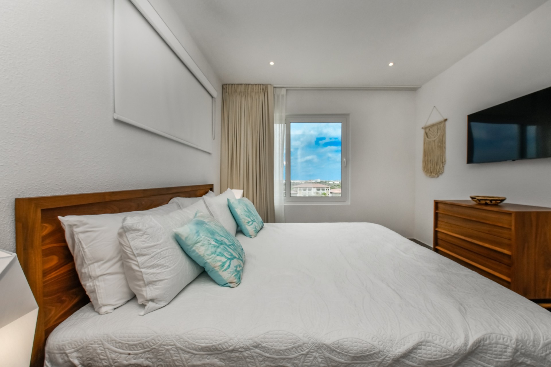 cozy modern bedroom at Commandeurs in Aruba For Sale