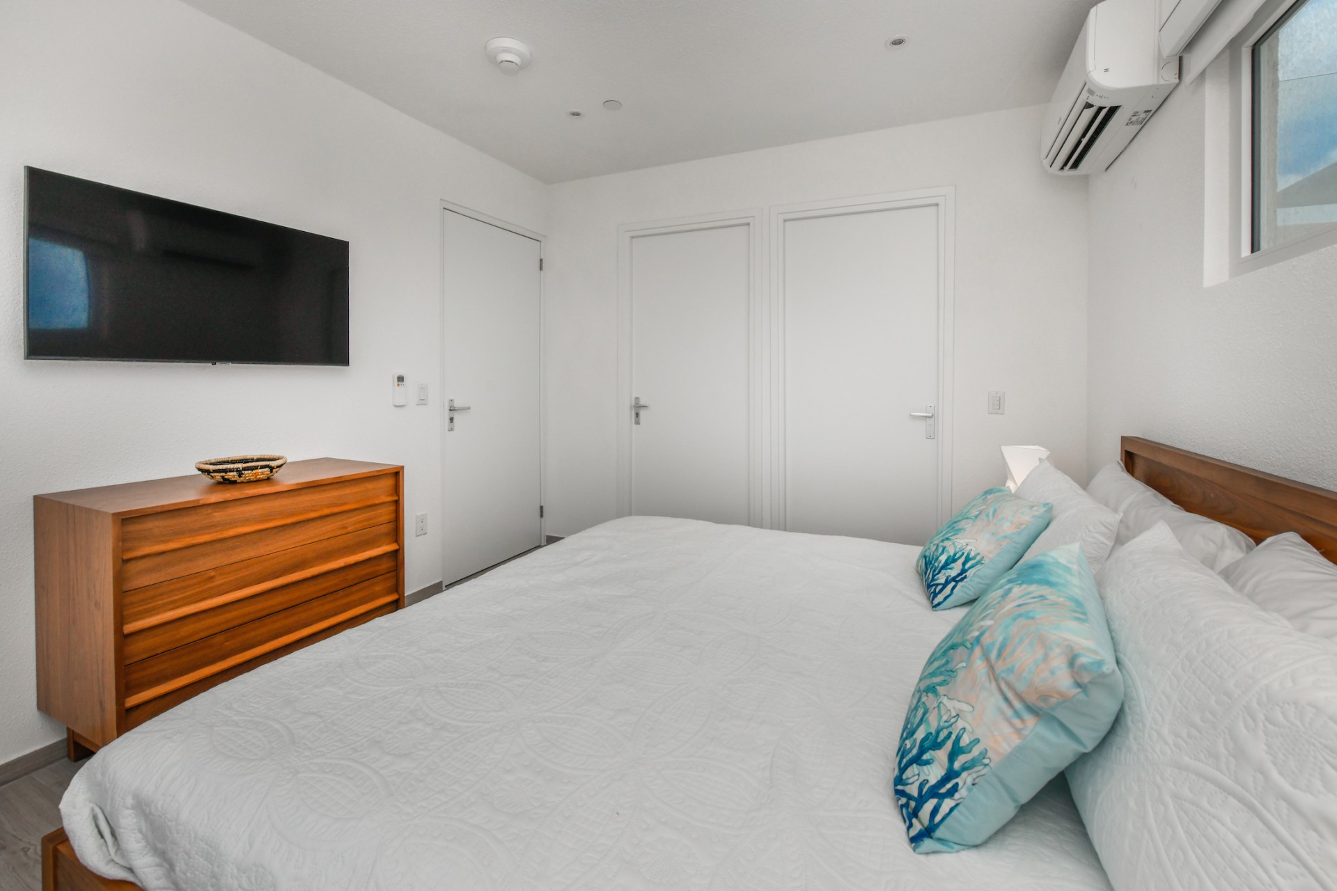 cozy modern bedroom at Commandeurs in Aruba For Sale, Res Realty
