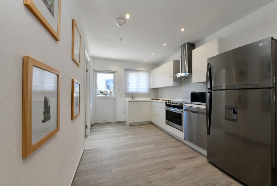 Modern white Kitchen at Commandeurs in Aruba FOR SALE