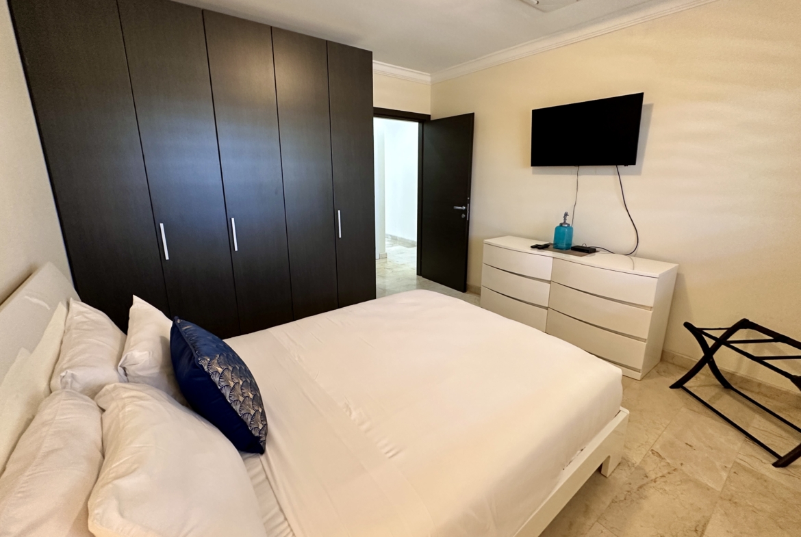 principal bedroom with closet - PalmAruba Condo on 4th floor