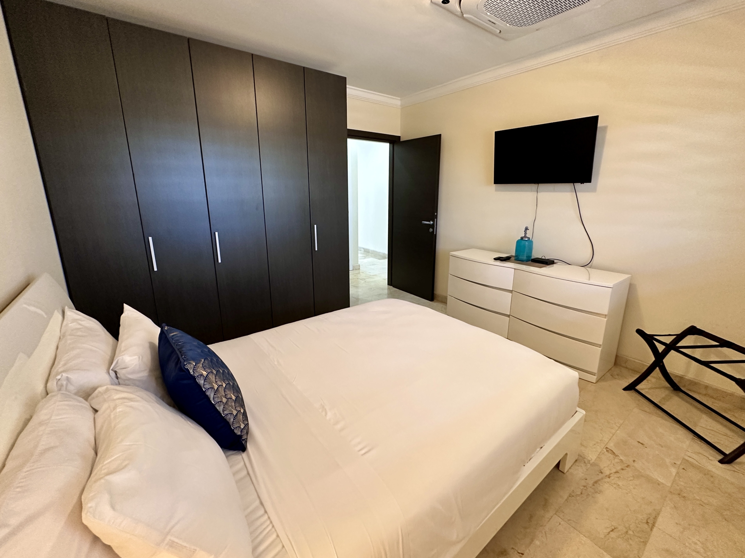 principal bedroom with closet - PalmAruba Condo on 4th floor