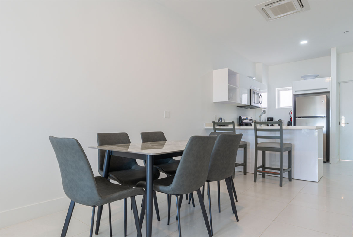 living room, luxury kitchen at Heritage Residences For Sale in Aruba